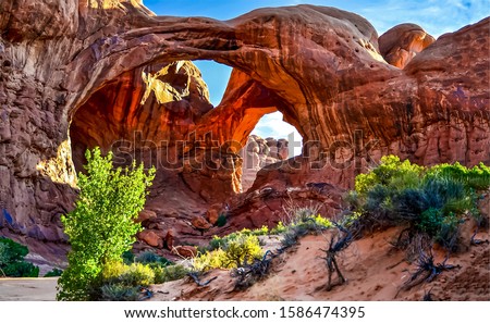 Red rock canyon arch mountain landscape in Nevada desert Royalty-Free Stock Photo #1586474395