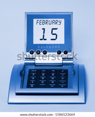 Old office watch with intro calendar winter month of February 15 date