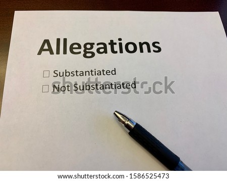 A paper with words relating to an investigation  Royalty-Free Stock Photo #1586525473