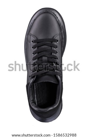Sport shoes. Black sneaker on a white background.