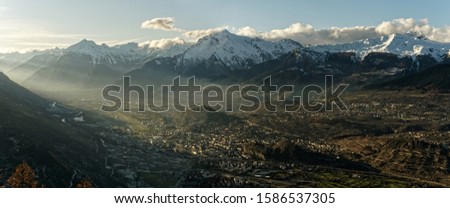 
Sunset over the Sion valley, Autumn in Canton of Valais, Switzerland Royalty-Free Stock Photo #1586537305