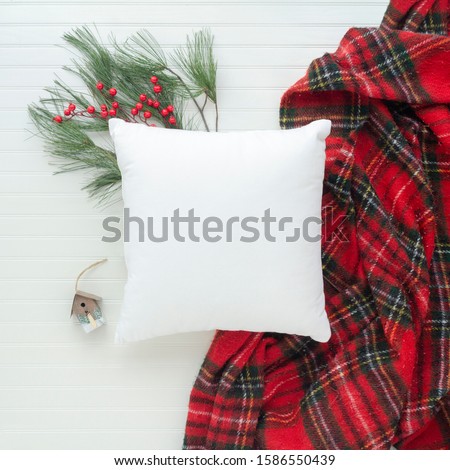 Pillow top view and styled with Christmas items with white background