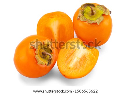 fresh ripe persimmons with leaf isolated on white background. full depth of field