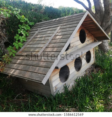 wooden multi large birdhouse in the garden