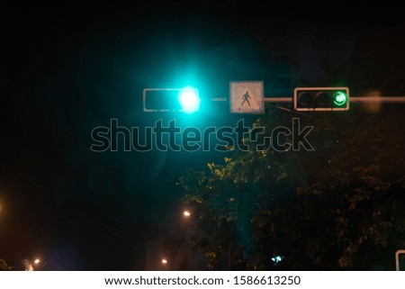 traffic lights, car lights at night on the road going to the city