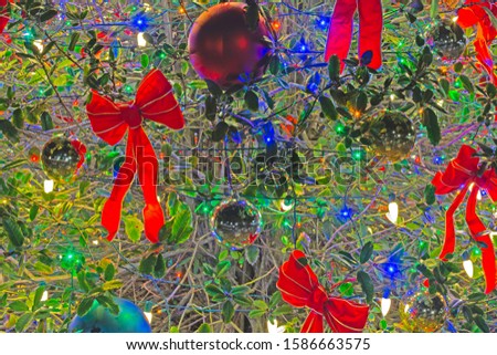 Closeup of a Christmas tree with decorations.