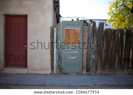 An old weathered door outside in Tucson, Arizona. 