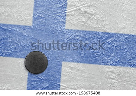 Washer and the image of the Finnish flag on a hockey rink