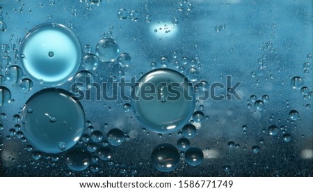 The circle from oil drops on the water surface is used as a background image.
