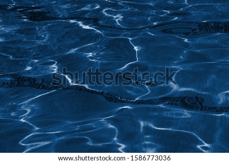 Abstract clean pool water surface background. Classic blue 2020 color trend