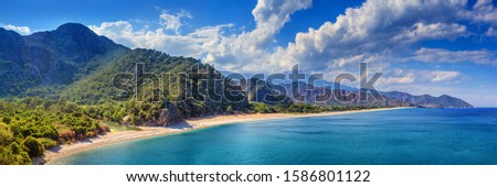 Summer mediterranean coastal landscape - view of the Cirali Olympos Beach, near the Turkish village of Cıralı, Antalya Province in Turkey