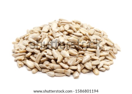 A handful of seeds on a white background