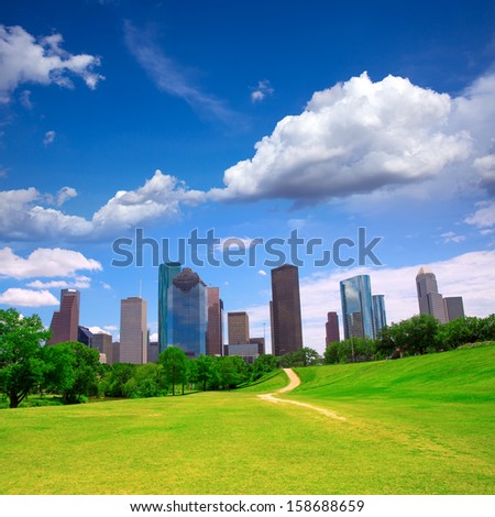Houston Texas Skyline with modern skyscrapers and blue sky view from park lawn
