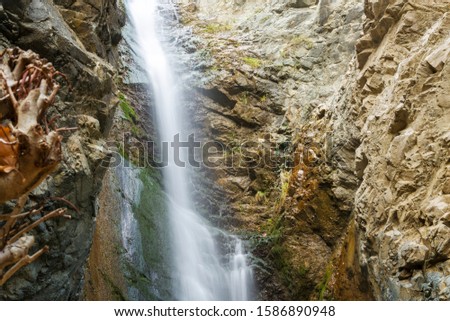 a view of a small waterfall in troodos mountains in cyprus. The Millomeris Waterfall.