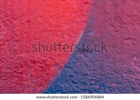 Beautiful bright colorful street art graffiti background. Abstract geometric spray drawing fashion colors on the walls of the city. Urban Culture detailed close up texture