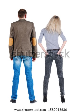 Back view of couple. beautiful friendly girl and guy together. Rear view people collection. backside view of person. Isolated over white background.