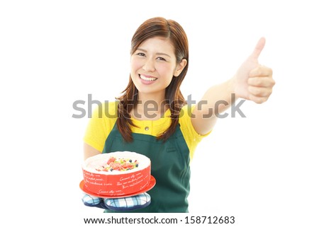 Young woman wearing kitchen apron 