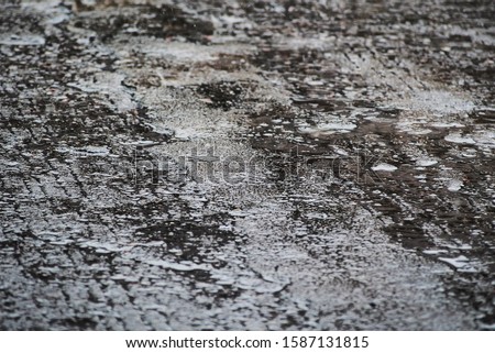 Raindrop falling on the cement floor background abstract
