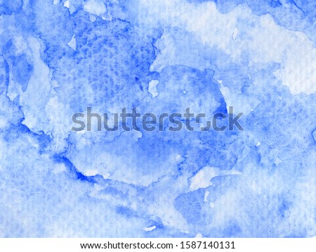 Hand drawn watercolor blue background with space for text or image. Abstract background.