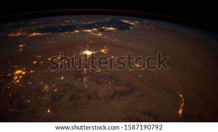 
Planet earth view from space. The light of burning cities is clearly visible