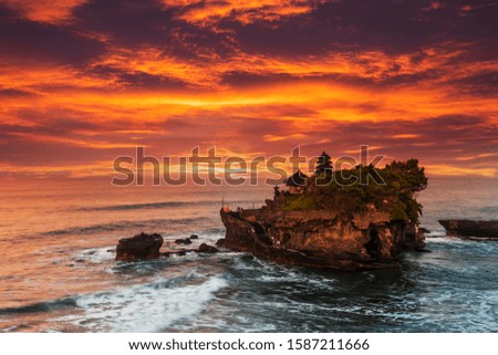 Sunset view of Tanah Lot temple, Bali Island, Indonesia. Royalty-Free Stock Photo #1587211666