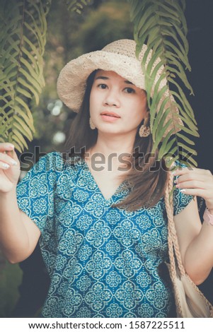Thai women wearing beautiful Thai cotton, cotton, navy color.