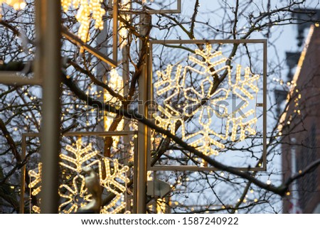 Snowflake light in a city holiday display