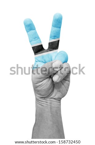 A hand painted with a Botswana flag making a V for victory symbol, isolated against white. 