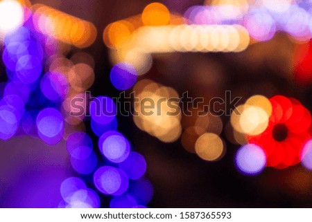 Abstract glowing blurred lights, defocused night city life
