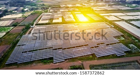 Aerial photography of solar photovoltaic under sunset