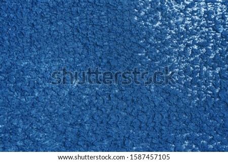 Fresh wet concrete texture. Cement wall, concrete floor for texture background. Color of the Year 2020 Classic Blue