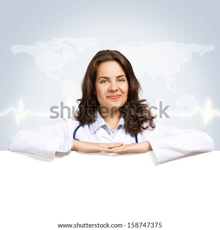 Young attractive female doctor put her hands on the blank banner, place for text