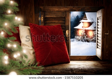Wooden dark window sill with free space for your decoration.Christmas tree and blurred lights.Dark night and moon on sky. 