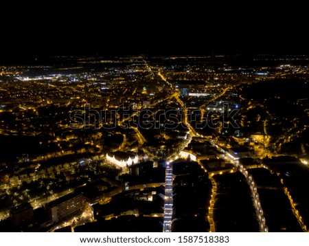Aerial night view of Brasov , a city in Romania