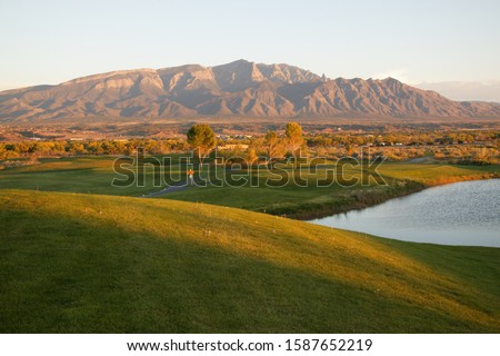 View of a Santa Ana Golf Club and Sandia mountains, Santa Ana Pueblo, New Mexico, USA Royalty-Free Stock Photo #1587652219