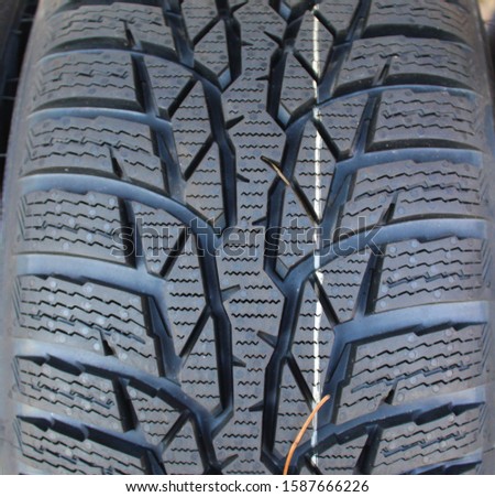 New winter tires, black winter tires. Image 