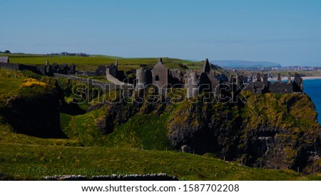 Landscape view of a castle on the mountain near ocean