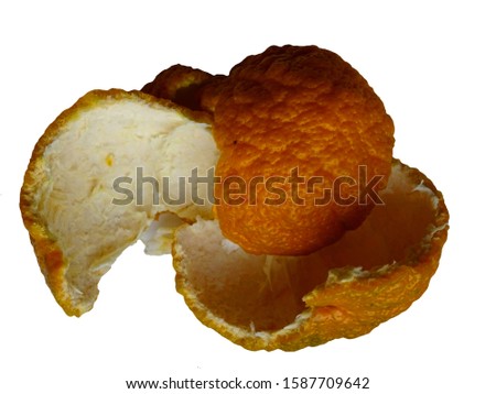 Peel of peeled citrus. Presumably an orange or tangerine shell.