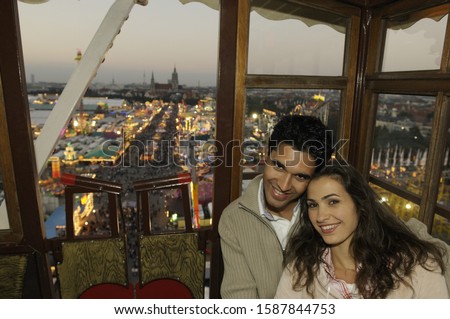 Couple over amusement park in Munich