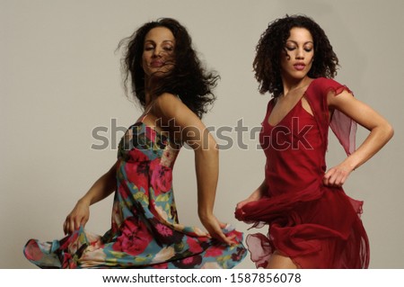 View of two young women dancing