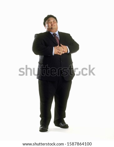 Portrait of a sumo wrestler in a business suit