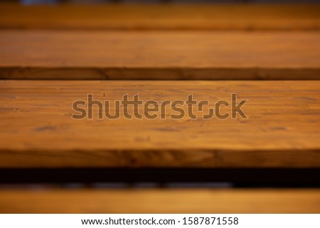 wooden planks lying one behind the other
