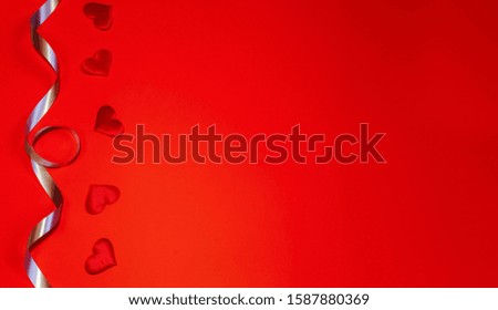 Valentine's day red background. Red hearts. Dressing. Minimalism. Space for text