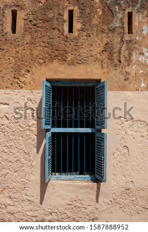 Window of the ancient prison cell in Zanzibar island