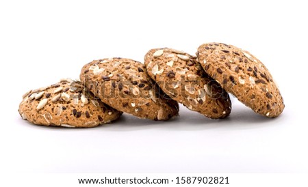 Cookies with sunflower seeds on a white isolated background