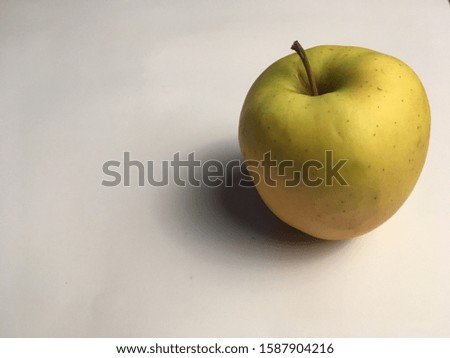 Green apple on a white background.
