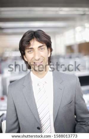 Close up of businessman smiling in office