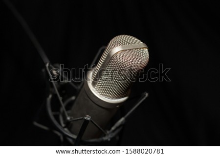 Recording microphone on black background