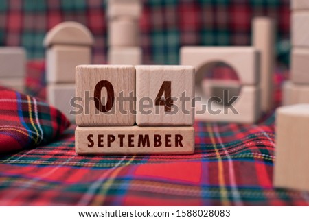 September 4 written with wooden blocks