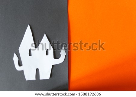 Howled castle on orange background with copy space